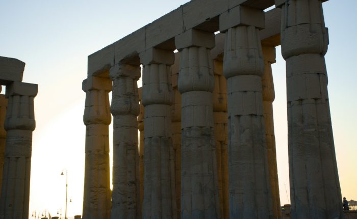 Columns of Luxor Temple at sunset, reached by private transfer from Luxor airport