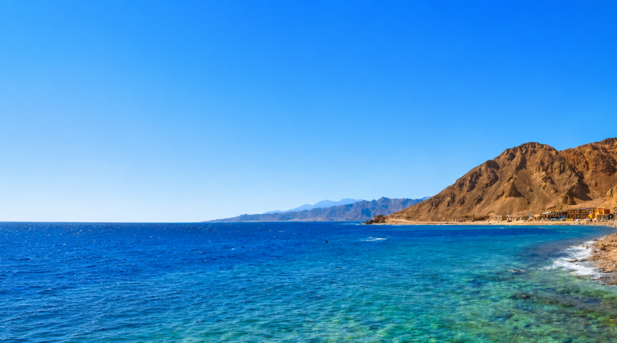 Dahab Tour from Sharm El Sheikh featuring the Colored Canyon, camel ride, Blue Hole, and Gulf of Aqaba scenery