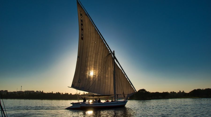 Felucca sailing on the Nile during an 8-day Egypt budget tour