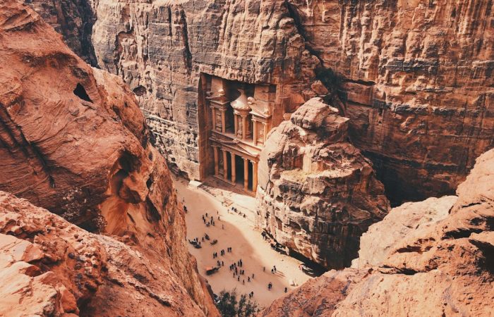 The rose-red Treasury facade at Petra seen from the Siq, a highlight of the Cairo Petra Wadi Rum tour