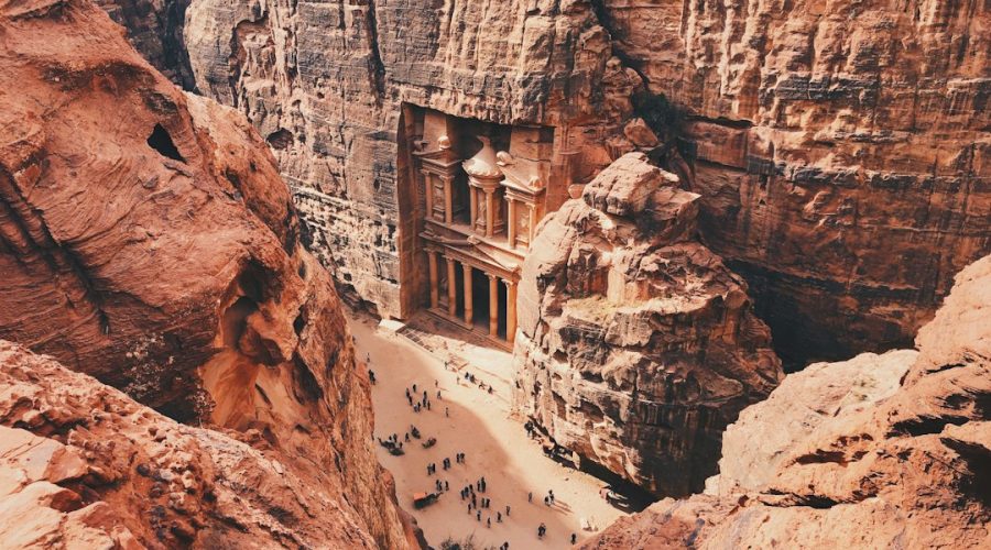 The rose-red Treasury facade at Petra seen from the Siq, a highlight of the Cairo Petra Wadi Rum tour
